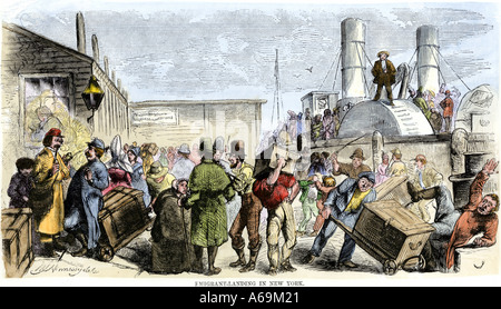 Immigrants landing in New York City 1850s. Hand-colored woodcut Stock Photo