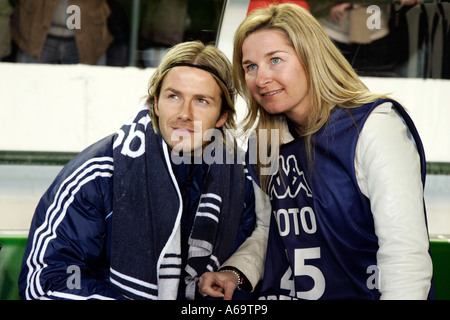 A young journalist girl posing with David Beckham Stock Photo