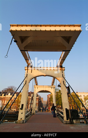 Magere brug or the Skinny bridge double drawbridge spanning the river Amstel since 1672 Amsterdam Netherlands Holland EU Europe Stock Photo