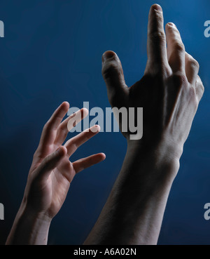 hands reaching out Stock Photo