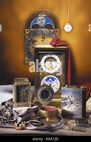 VDA77202 collection of antique clocks with a warm background Stock Photo