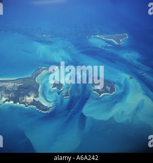 Aerial view high over Exuma Cays with view of shallow sea white sandbanks and islands in The Exumas group The Bahamas Stock Photo