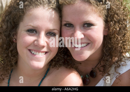 Twins laughing together at Grand Old Day Street Fair. St Paul Minnesota USA Stock Photo