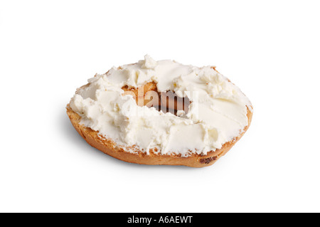 Cinnamon and raisin bagel with cream cheese on white background Stock Photo