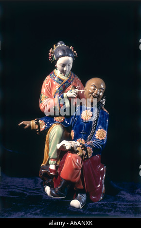 China, Kowloon, Tsim Sha Tsui, traditional ceramic figures on display in store Stock Photo