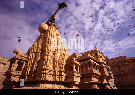 India Jaisalmer inside the Fort the jainist temple and behind the Palace of the Marahja Stock Photo