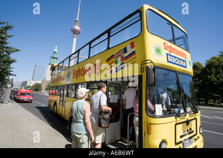 Tourists board a City Circle Sightseeing bus in Berlin Germany Stock Photo