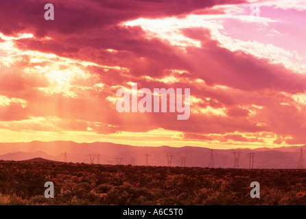 Sun rays and power lines Nevada USA Stock Photo - Alamy