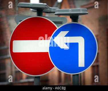 No entry and turn left road signs in Birmingham City centre Stock Photo