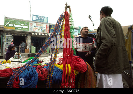 Pakistan Swat Valley Mingora Bazaar rope salesman Stock Photo