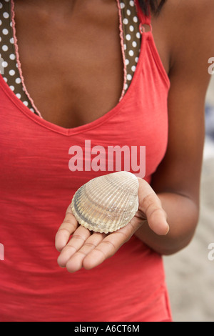 Woman Holding Shell