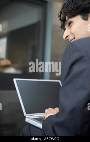 Businessman Using Laptop Stock Photo