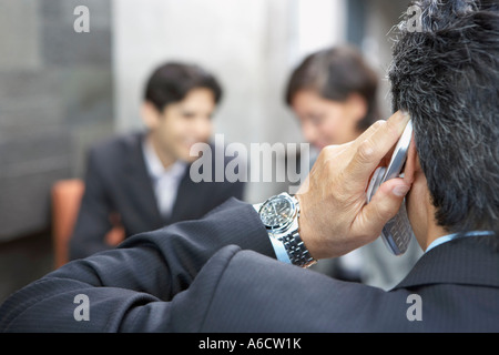 Businessman Using Cell Phone Stock Photo