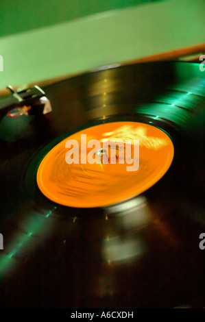 spinning records on a deck or record player used to play at discos Stock Photo