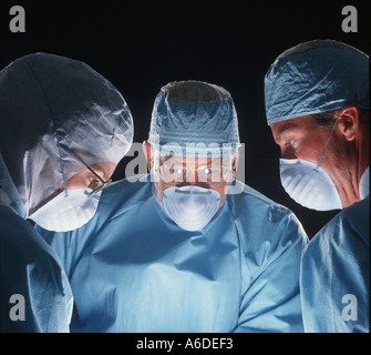 medical team performing surgery in hospital Stock Photo