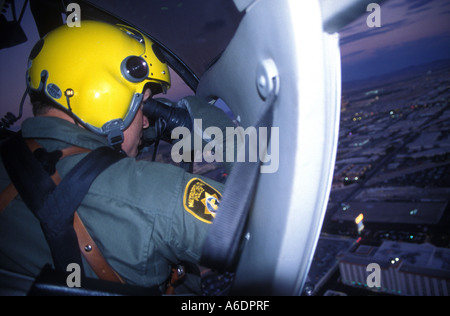 Las Vegas police helicopter crew search for a car used in a robbery Stock Photo