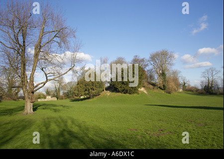 Part of the ruined walls of Bramber Castle, West Sussex against blue skies Stock Photo