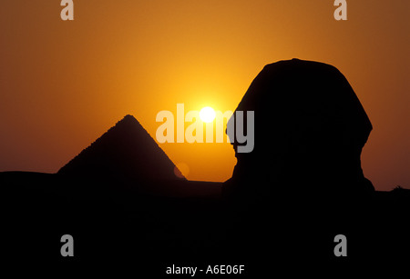 The Sphinx and Pyramids of Giza at Sunset, Egypt Stock Photo