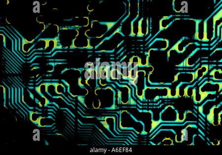 electronic circuitboard abstract image with light projected from behind Stock Photo