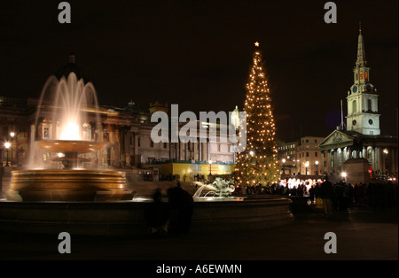 Christmas at night, Trafalgar Square, London UK Stock Photo