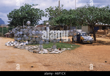 Hub caps for sale on the side of the road near Nkawkaw, Ghana, West Africa Stock Photo