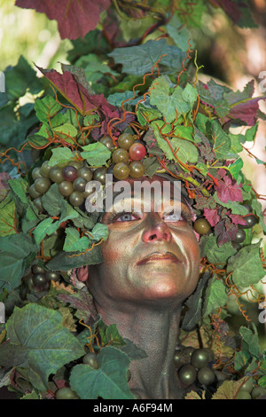 Beautiful lady disguised as a grape vine, Animal Kingdom, Disney World, Orlando, Florida, USA Stock Photo