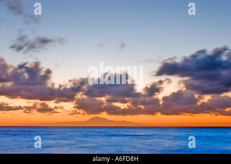 Volcano Mount Pico de Teide on Tenerife highest Mountain of Spain in the morning over blue ocean seen from La Palma Canaries Stock Photo