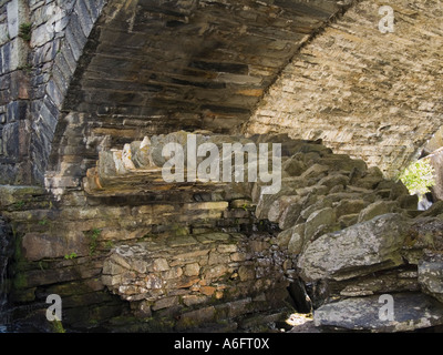 Old Drovers road packhorse bridge under A5 road bridge Pont Pen y benglog. Snowdonia National Park Ogwen Gwynedd North Wales UK Stock Photo