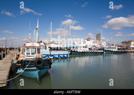 Town Camber fish docks with waterbus tug boats in harbour Old Portsmouth Hampshire England Stock Photo