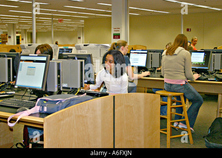 Ethnic students studying using reference computers in new library Oregon State University in Corvallis Oregon Stock Photo