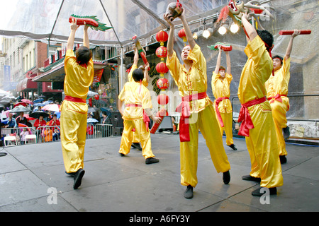 Traditional Chinese dancers performance at Chinatown street fair during Chinese New Year parade weekend San Francisco California Stock Photo