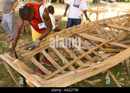 Boat builder Jean Gesner Elian from Luly on the southern coast of Haiti constructs boat by hand Smithsonian Folklife Festival Stock Photo