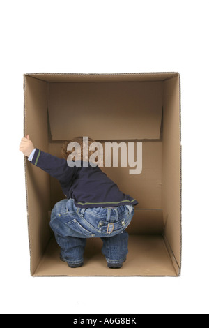 children inspecting box Stock Photo