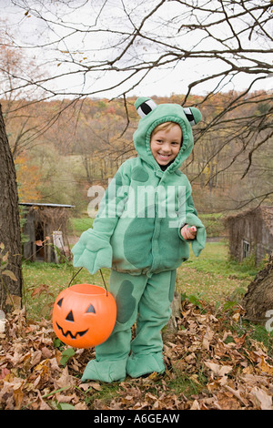 Boy in a frog costume Stock Photo