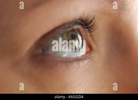 close up of female eye looking up Stock Photo