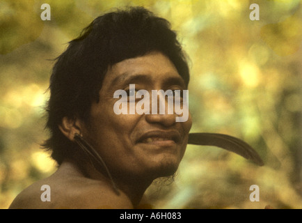 Portrait of E´ñepa (Panare) man with feather ear ornaments in i5he rainforest in southern Venezuela. The E´ñepa speak a Cariban language. Stock Photo