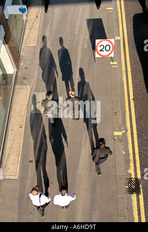 A crowd of people on a London street paveement as seen from above Stock Photo