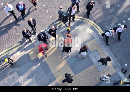 A crowd of people at a London street corner as seen from above Stock Photo