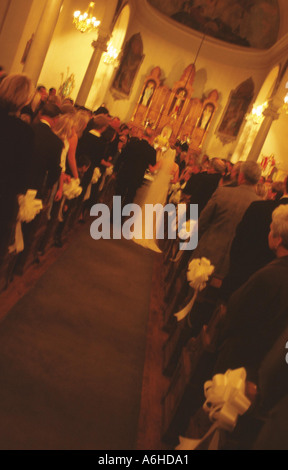 Bride and Father Walking Down Aisle Stock Photo