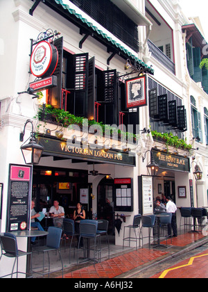 Traditional English style pub The Penny Black in the Boat Quay waterfront restaurant and pub pedestrian street Singapore Stock Photo