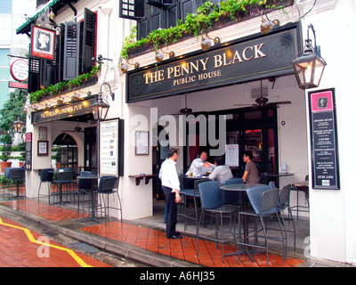 Traditional English style pub The Penny Black in the Boat Quay waterfront restaurant and pub pedestrian street Singapore Stock Photo