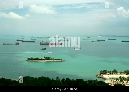 Ships and tankers lie at anchor off Singapore Stock Photo