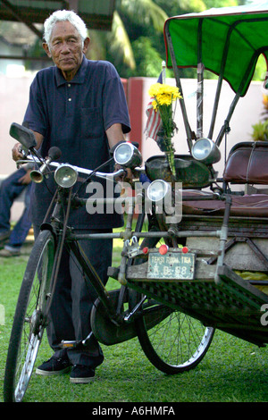 Malaysia, Kota Bharu, old man with traditional whip top Stock Photo - Alamy