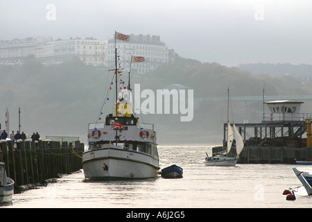 Pleasure steamer in Scarborough harbour on a misty grey day. Stock Photo