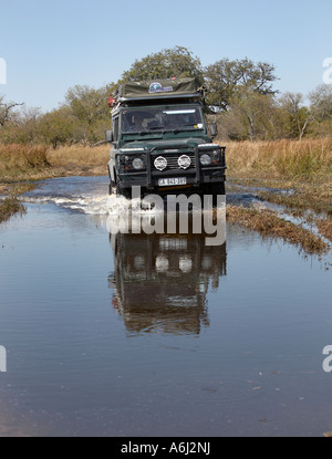 Land Rover 110 Wading Through Water Stock Photo