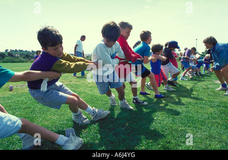 Rope pulling game portrait of kids in summer camp Stock Photo - Alamy