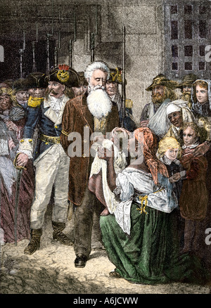 John Brown stopping to see a black child on his way to execution for his raid on Harpers Ferry West Virginia, 1859. Hand-colored woodcut Stock Photo