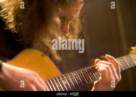 Guitarist Cliff Knizley performing on acoustic guitar Stock Photo