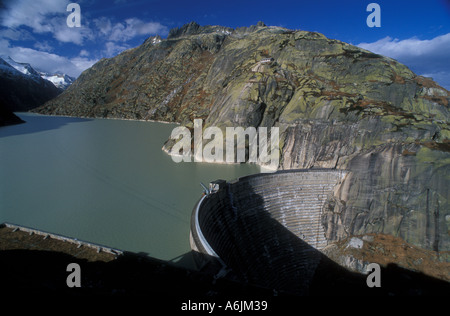 Concret dam Lauteraar lake Hydroelectric power plant Grimsel Pass Bernese Alps Switzerland Stock Photo