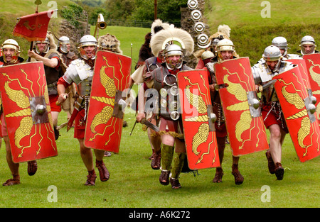 Ermine Street Guard give a display of fighting skills in the Roman Amphitheatre at Caerleon near Newport Gwent Wales UK Stock Photo